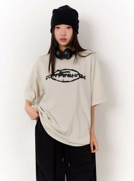oversized-washed-graphic-tee-iu509 / light beige