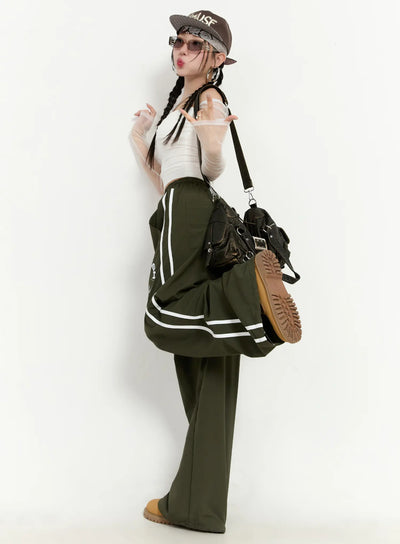 graphic-wide-leg-track-pants-cm511 / Dark green