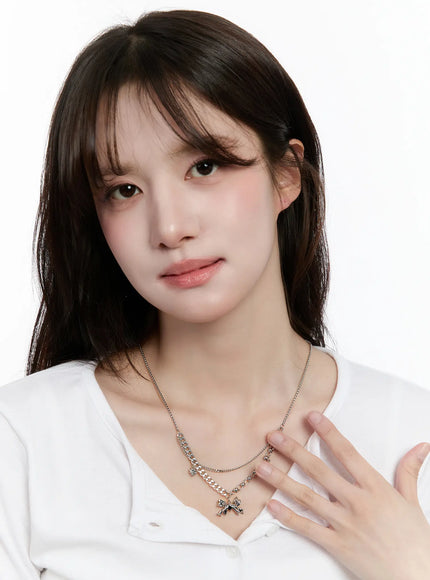 layered-bow-charm-necklace-cm505