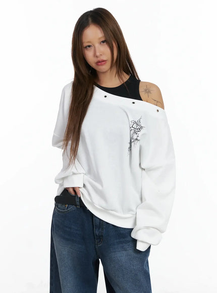off-shoulder-eyelet-graphic-sweater-in528