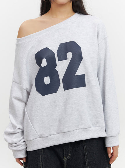 one-shoulder-graphic-crewneck-if510