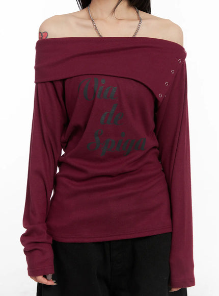off-shoulder-graphic-button-long-sleeve-top-cd508