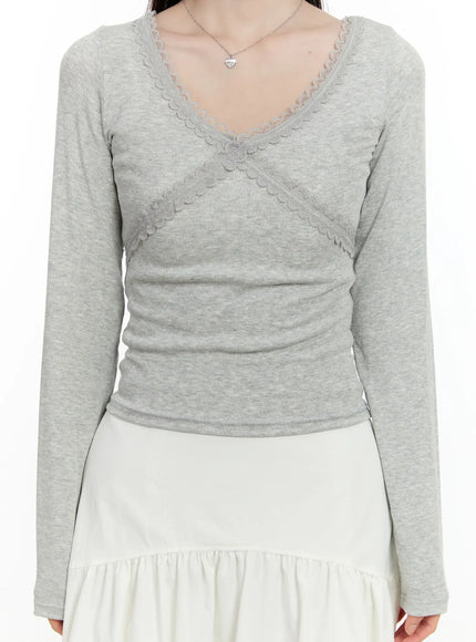 lace-trimmed-v-neck-long-sleeve-top-cm505