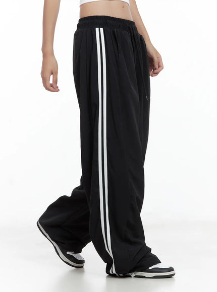 striped-wide-leg-nylon-track-pants-cl509