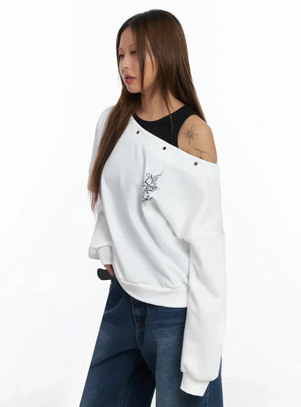 off-shoulder-eyelet-graphic-sweater-in528