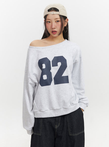 one-shoulder-graphic-crewneck-if510