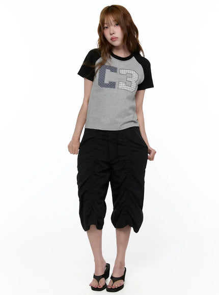 checkered-graphic-short-sleeve-top-ca522