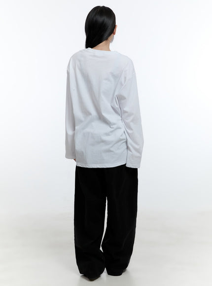 oversized-graphic-phrase-long-sleeve-top-cd424