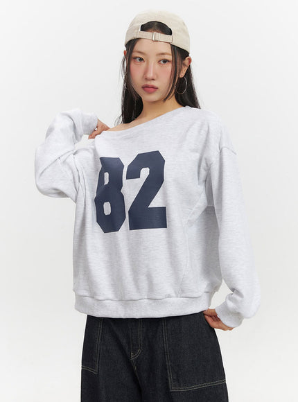 one-shoulder-graphic-crewneck-if510