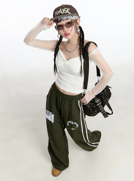 graphic-wide-leg-track-pants-cm511