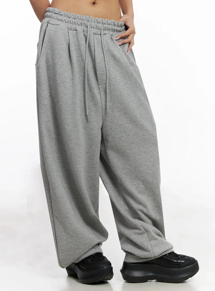studded-cross-baggy-sweatpants-iy501
