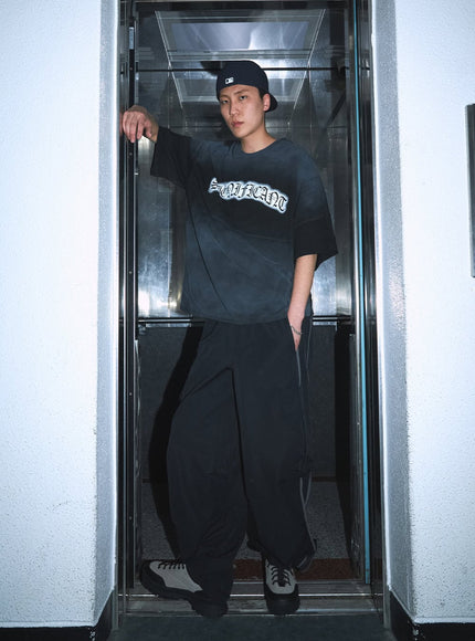 men-s-cargo-balloon-fit-windbreaker-pants-black-iu503