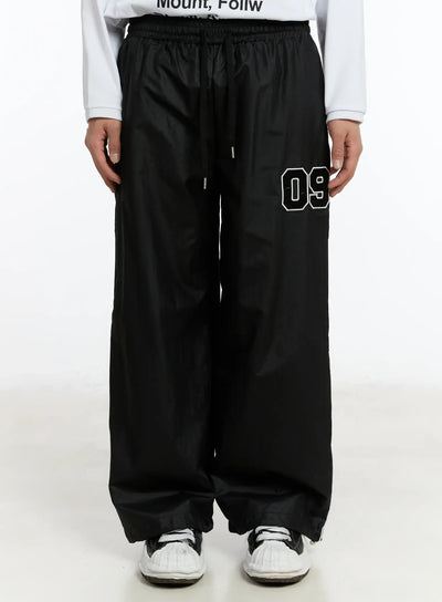 mens-09-graphic-nylon-drawstring-pants-im503 / Black