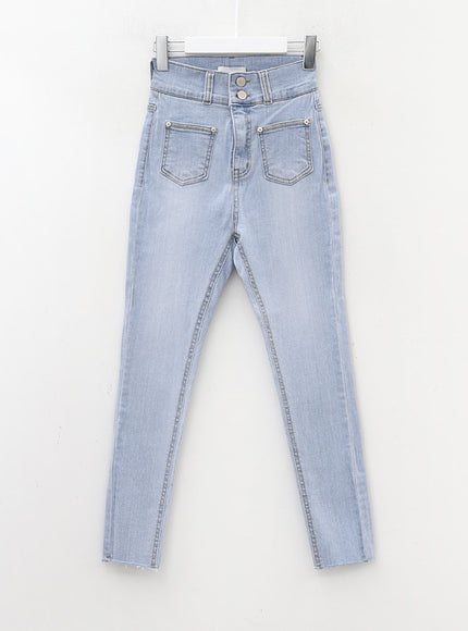 Double Button Raw Hem Skinny Jeans IA11