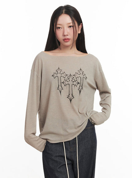 one-shoulder-sheer-long-sleeve-graphic-top-im528 / Beige