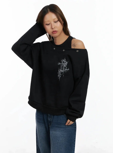 off-shoulder-eyelet-graphic-sweater-in528 / Black
