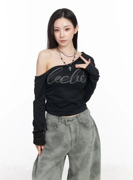 rhinestone-asymmetric-off-shoulder-long-sleeve-top-cm519 / Black